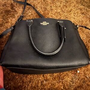 Small black Coach purse. Non-smoking, pet free home. Great condition!